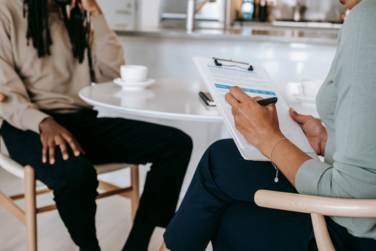 Two people sitting at an interview