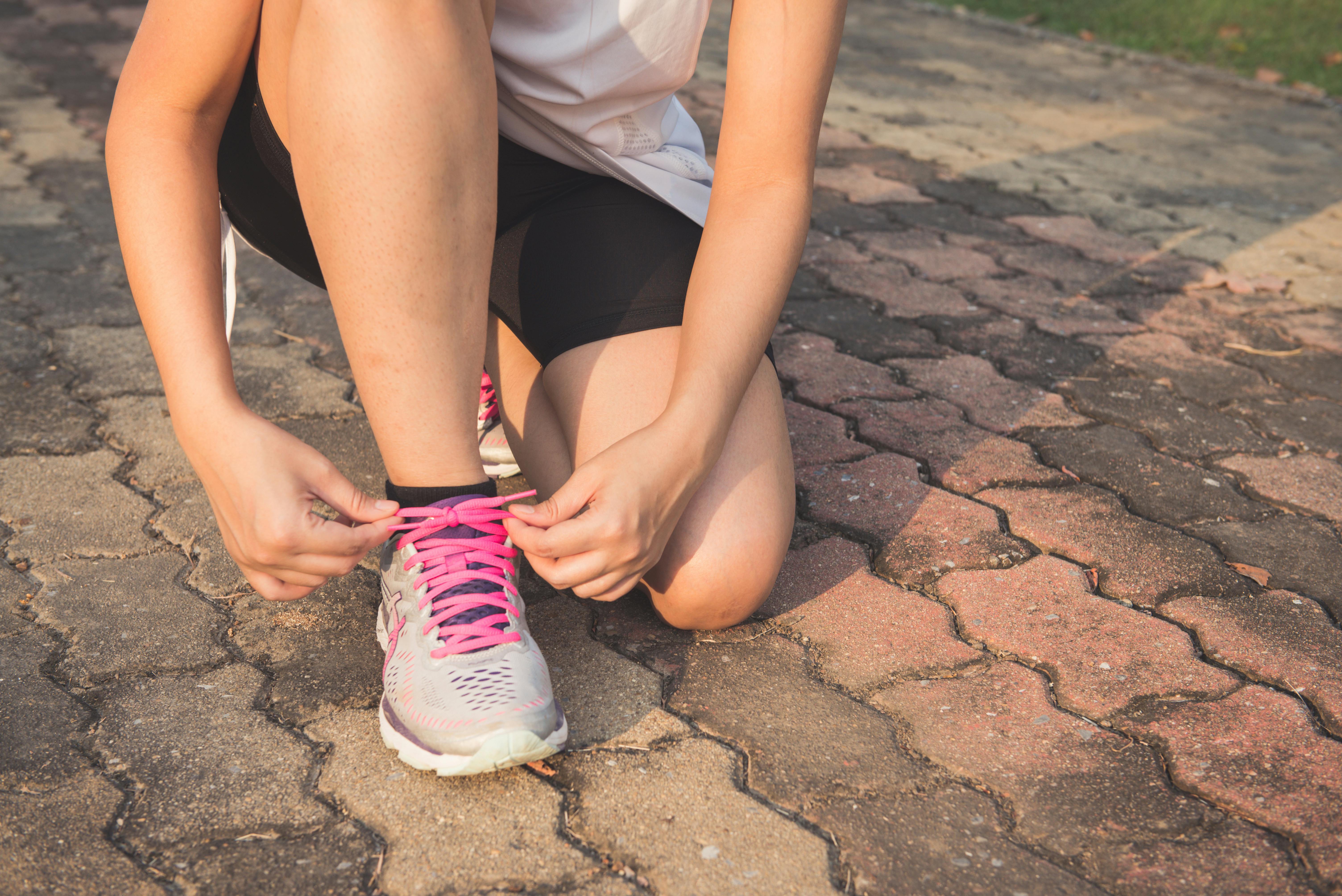 Tying a running shoe