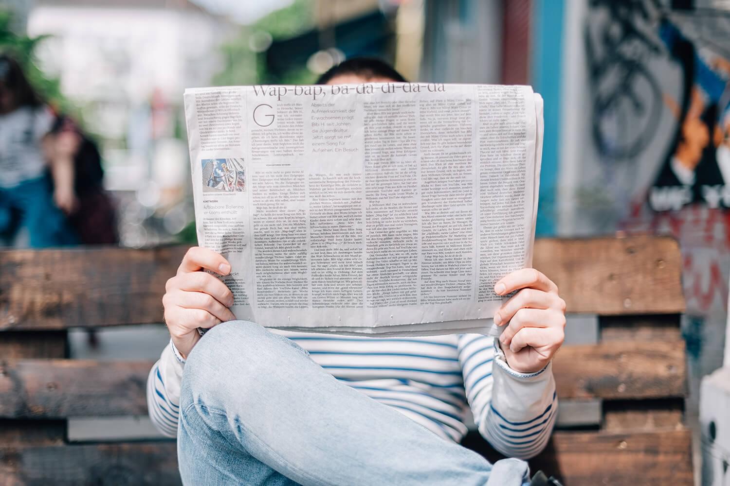 Man reading news